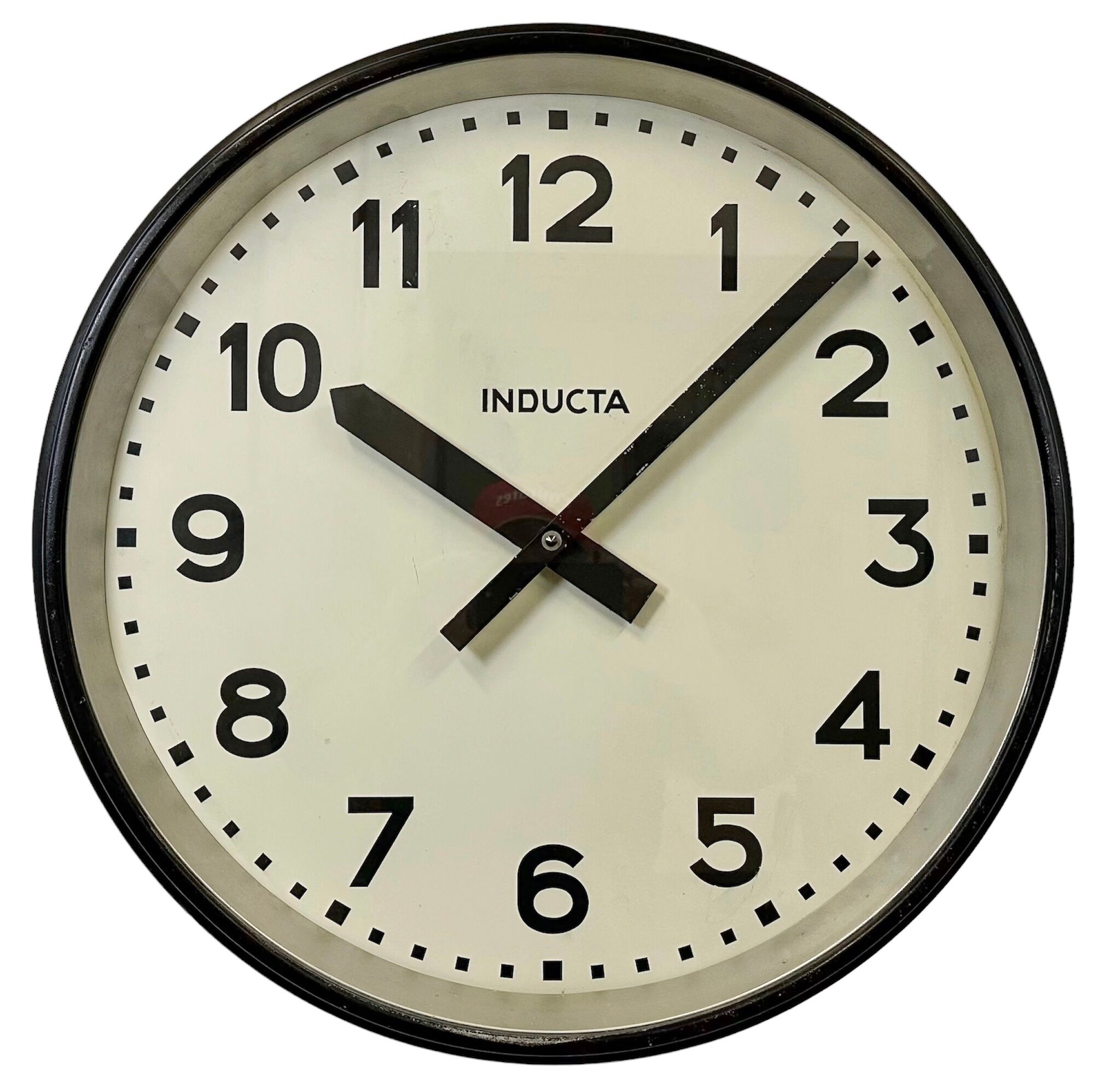 Black swiss industrial wall clock from inducta, 1960s