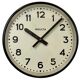 Black swiss industrial wall clock from inducta, 1960s