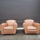 Pair of club chairs in skai