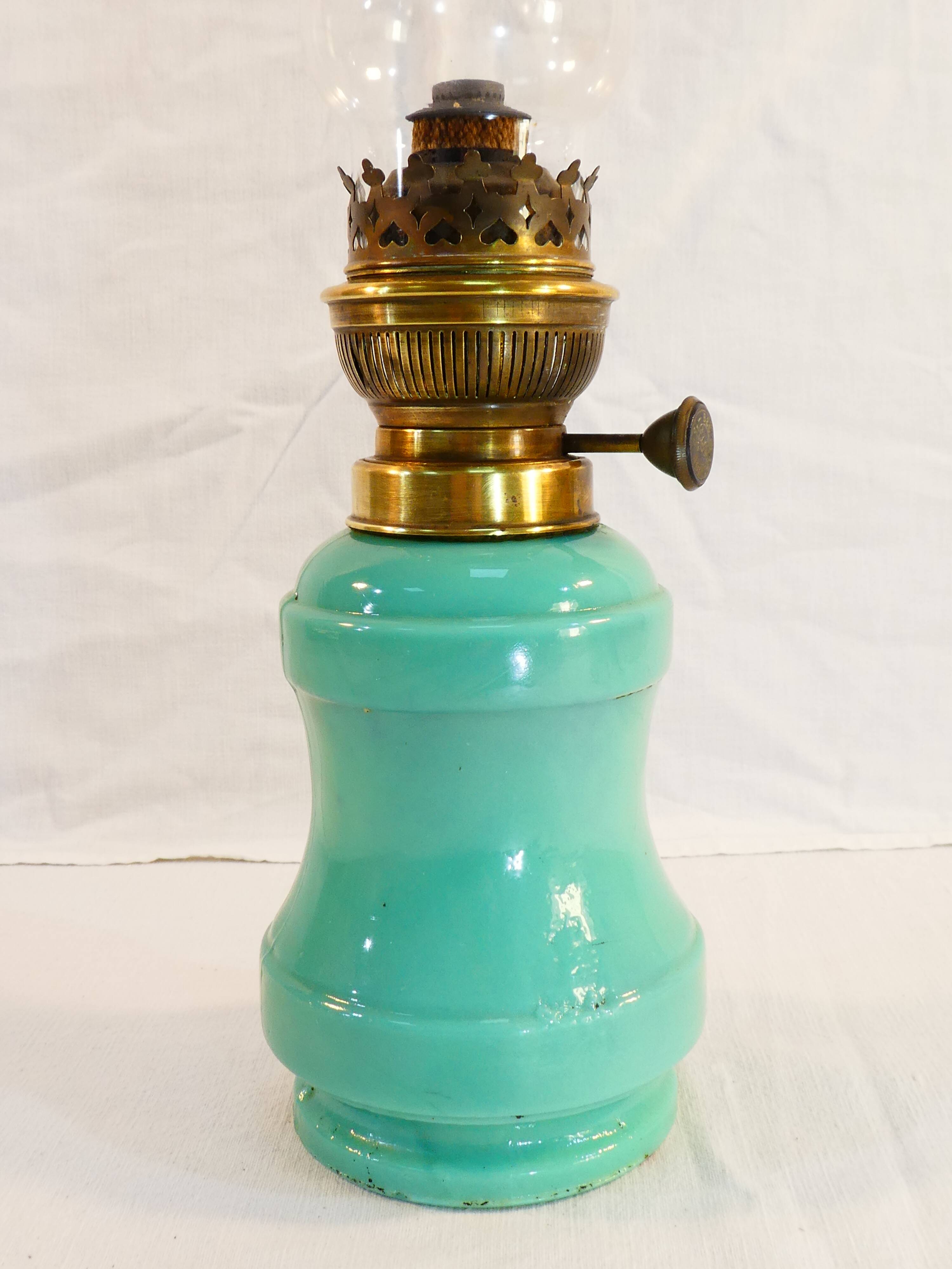 Ancient lampe a petrole in green opaline
