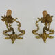 Vintage pair of bronze wall sconces from the 1950s and 60s.