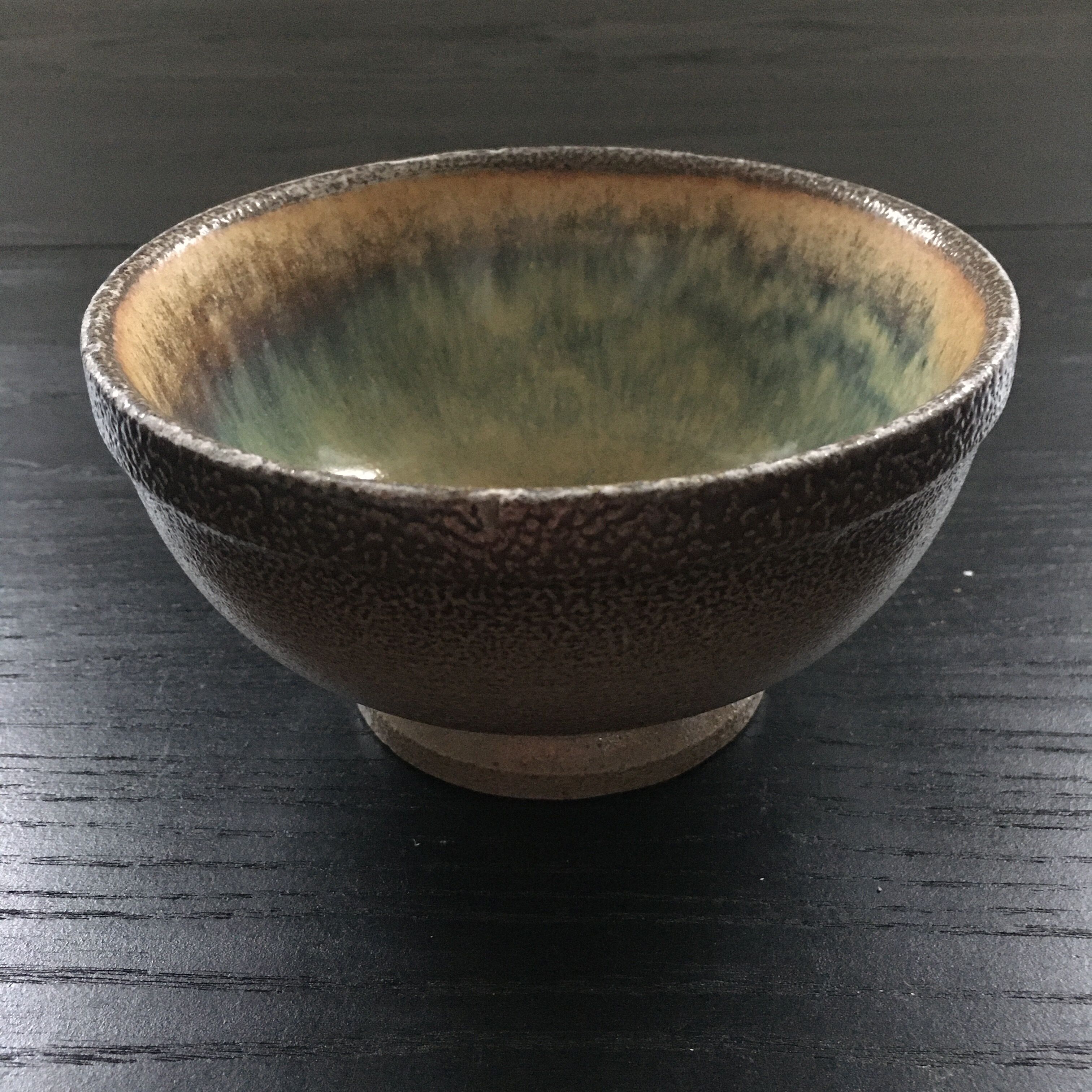 Stoneware bowl with flamed glaze