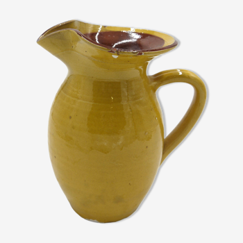 Yellow ceramic pitcher