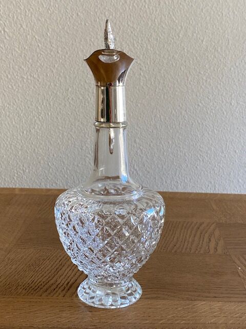 Glass and silver metal ewer