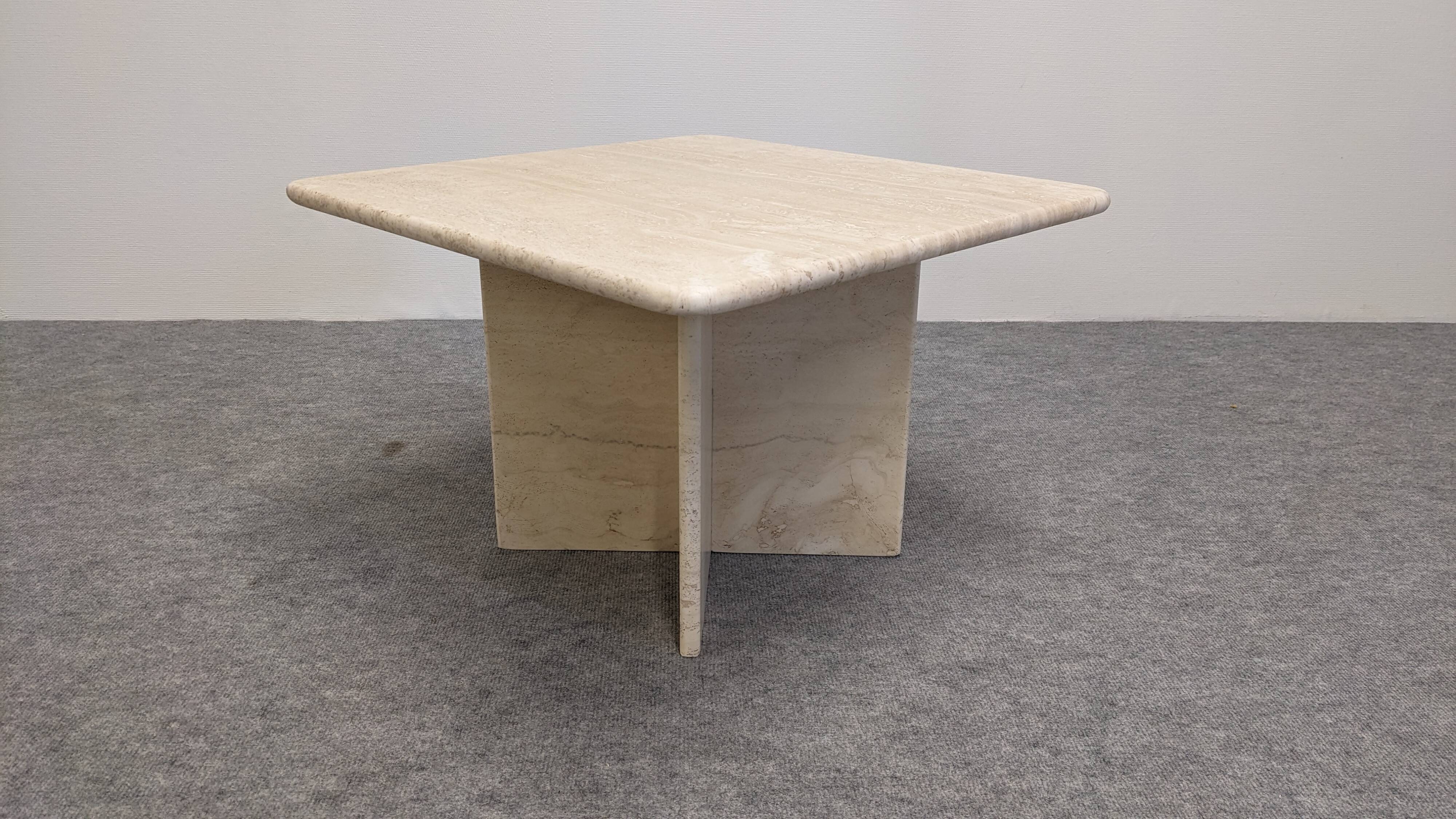 Coffee table or side table in travertine, Italy around 1970.