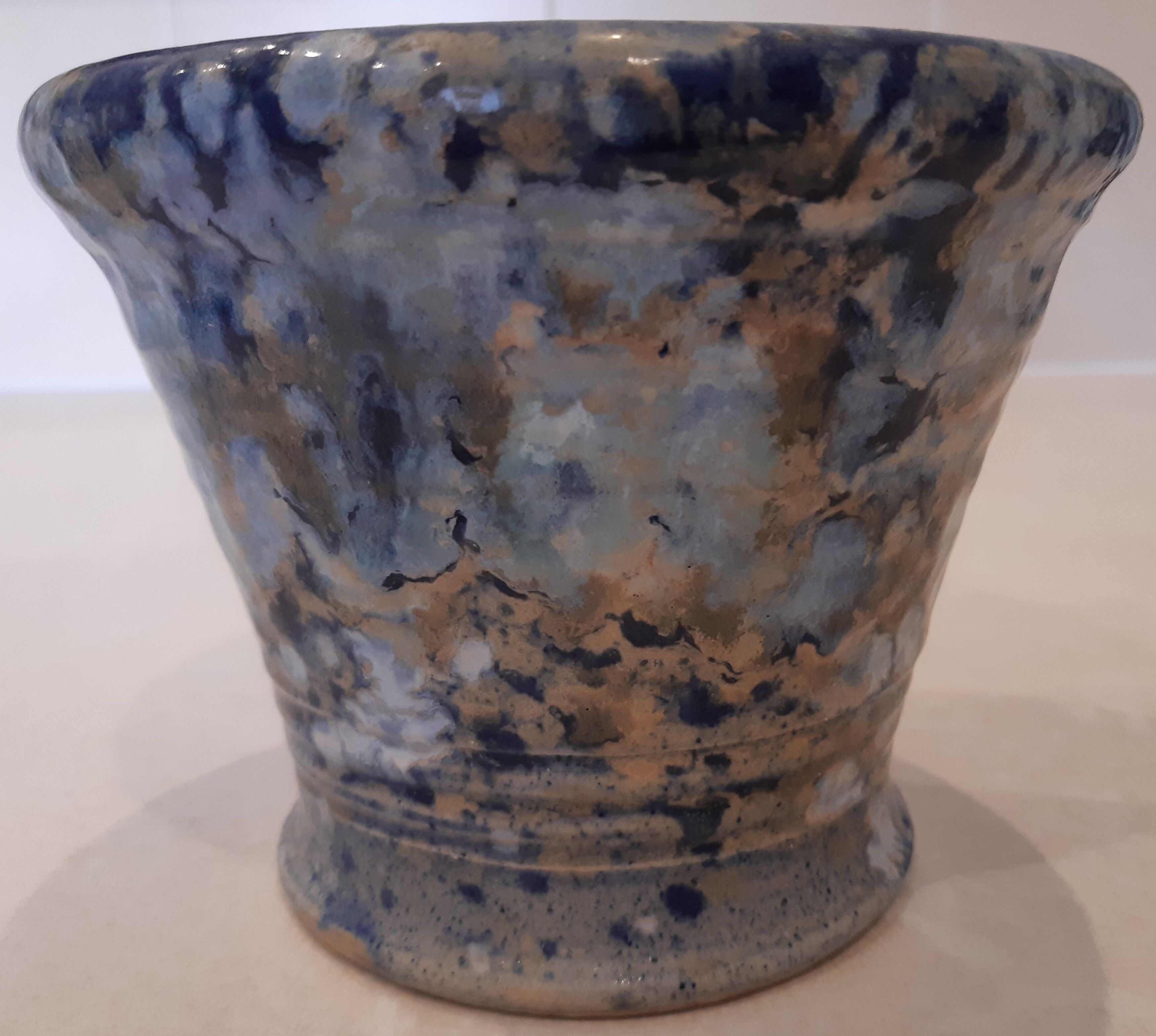 Pot cover, fawn blue and gray décor.