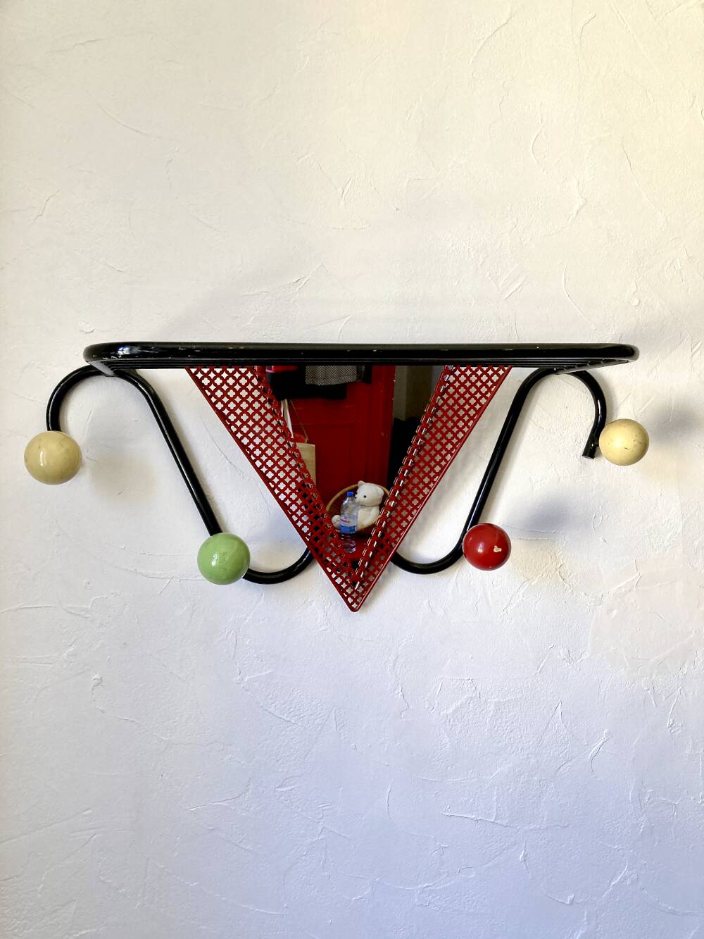 Wall coat rack, 1950s, attributed to Mathieu Matégot.