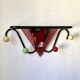 Wall coat rack, 1950s, attributed to Mathieu Matégot.