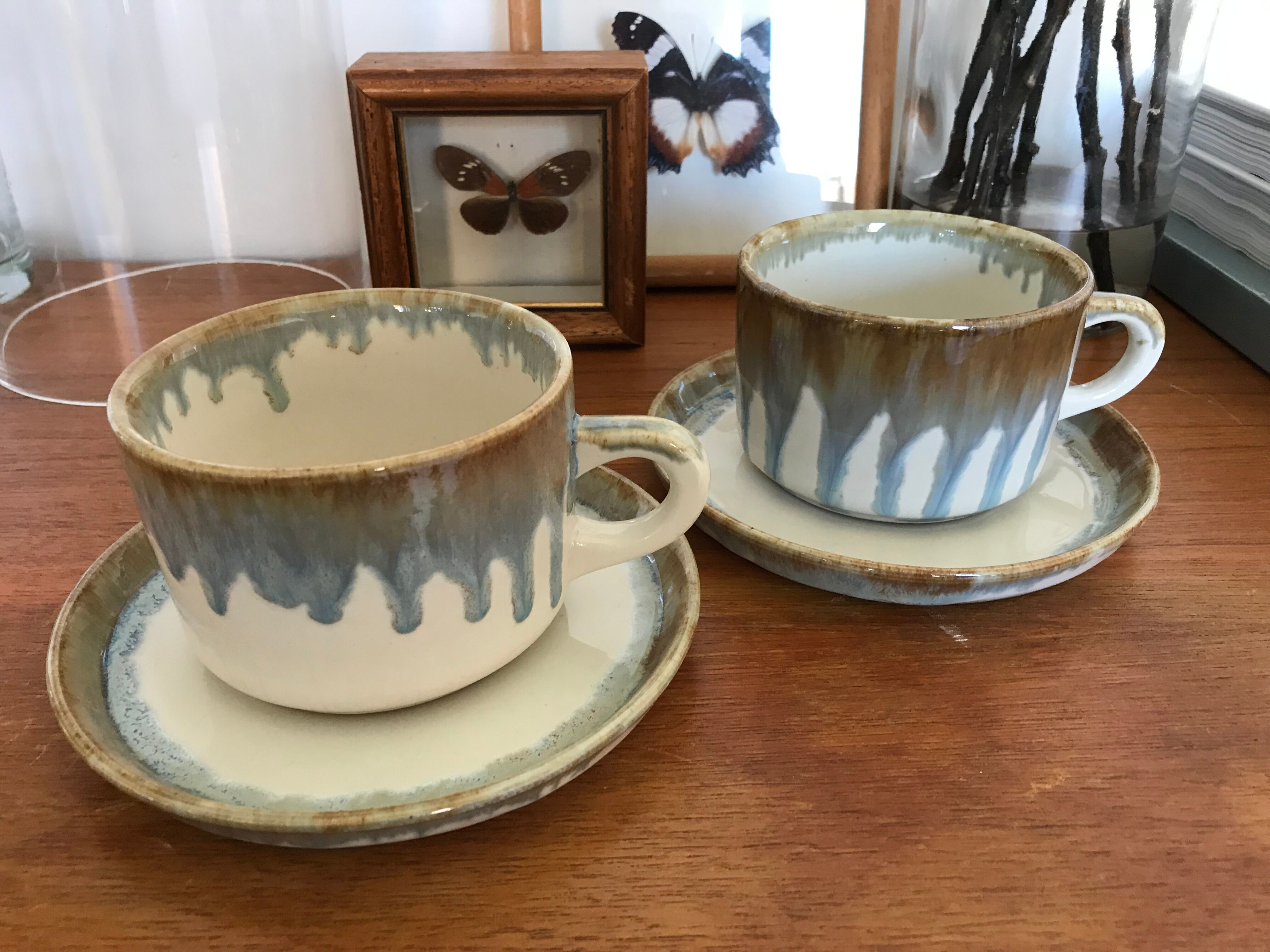 Mugs with saucers