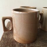 Lot of three cups or mugs stoneware of great fire of Brenne, France
