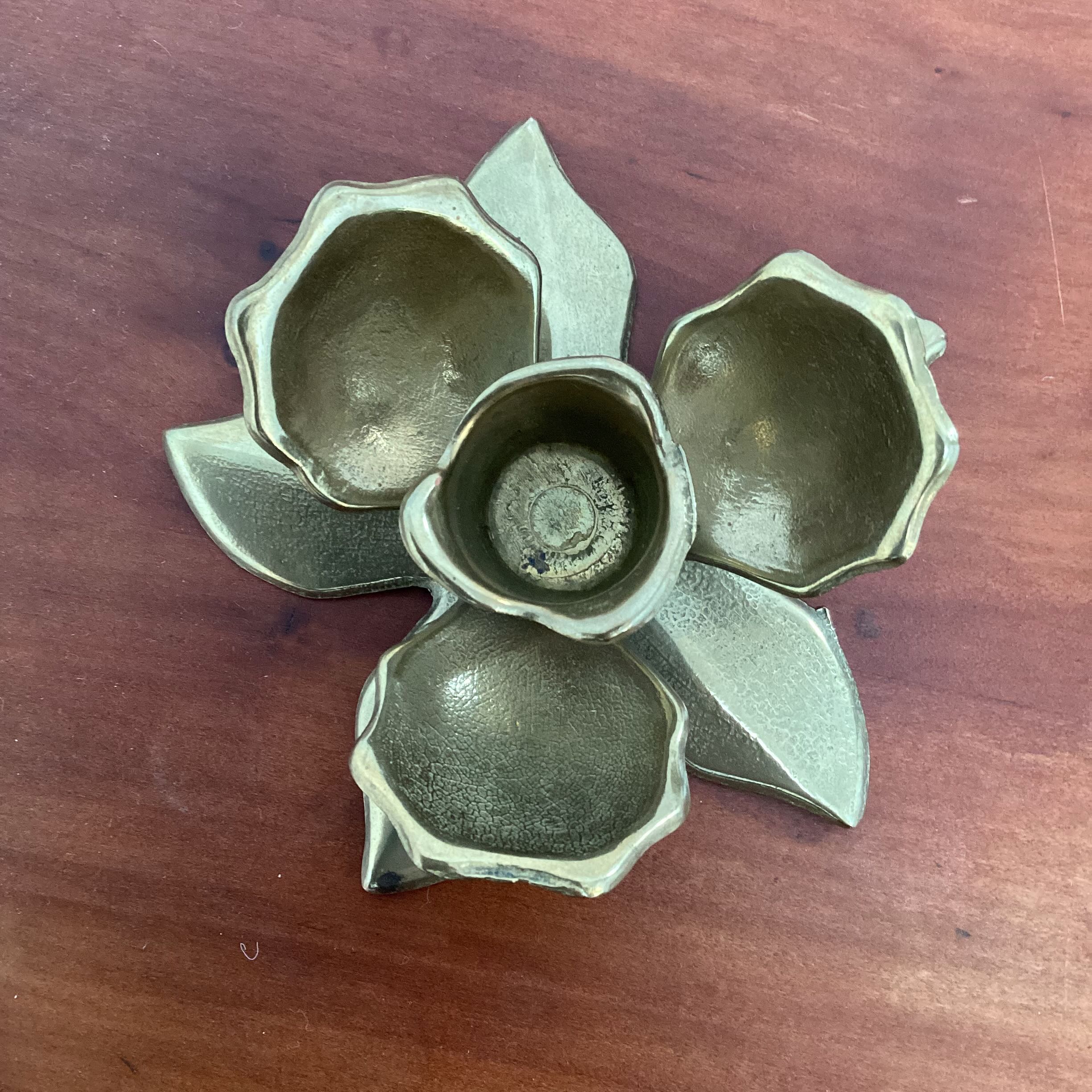 Brass flower candle holder