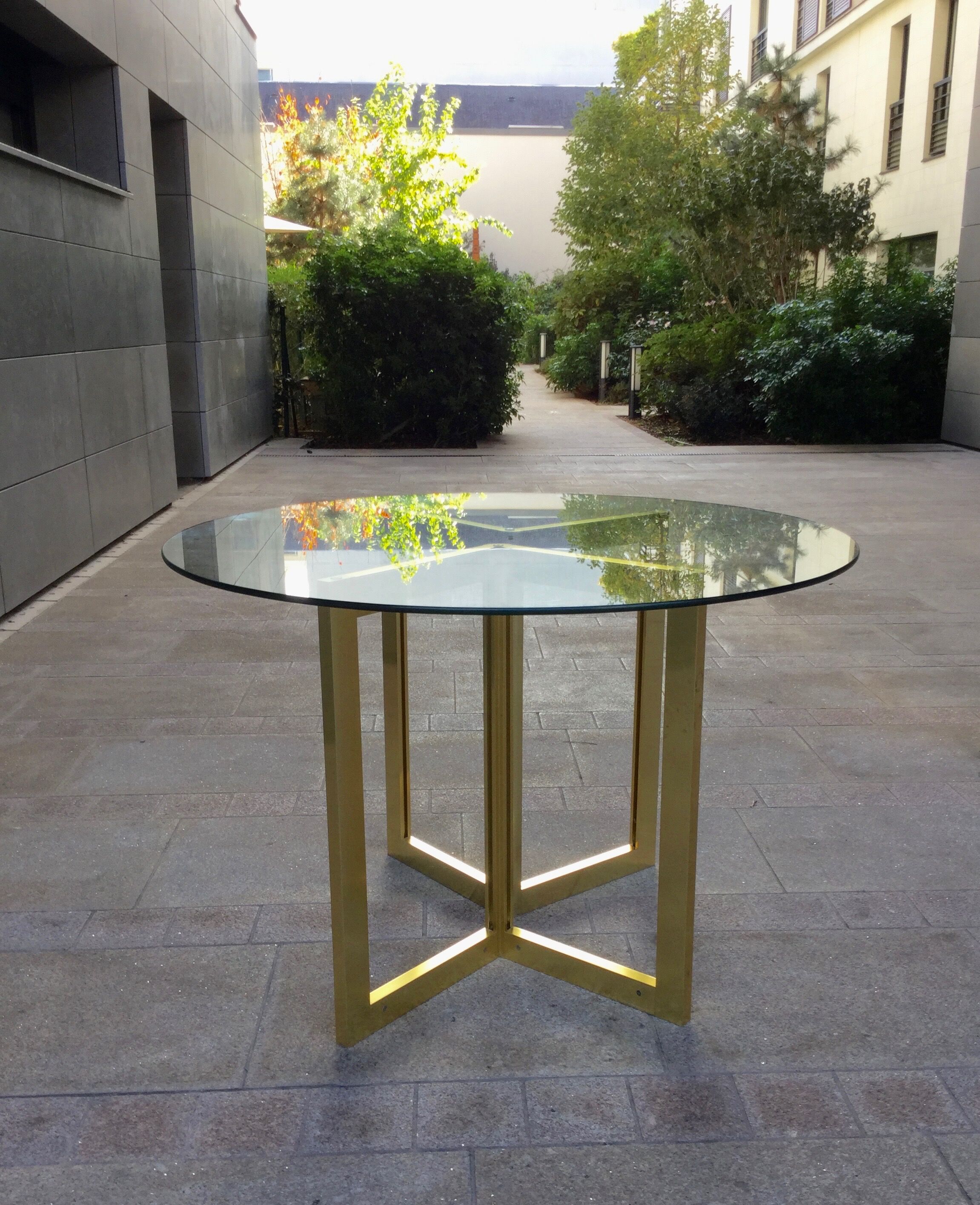 Table à diner ronde verre et métal doré ,vintage années 80'