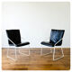Series of 4 leather chairs, white lace-up sled
