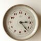 Clock in the shape of a round plate Junghans