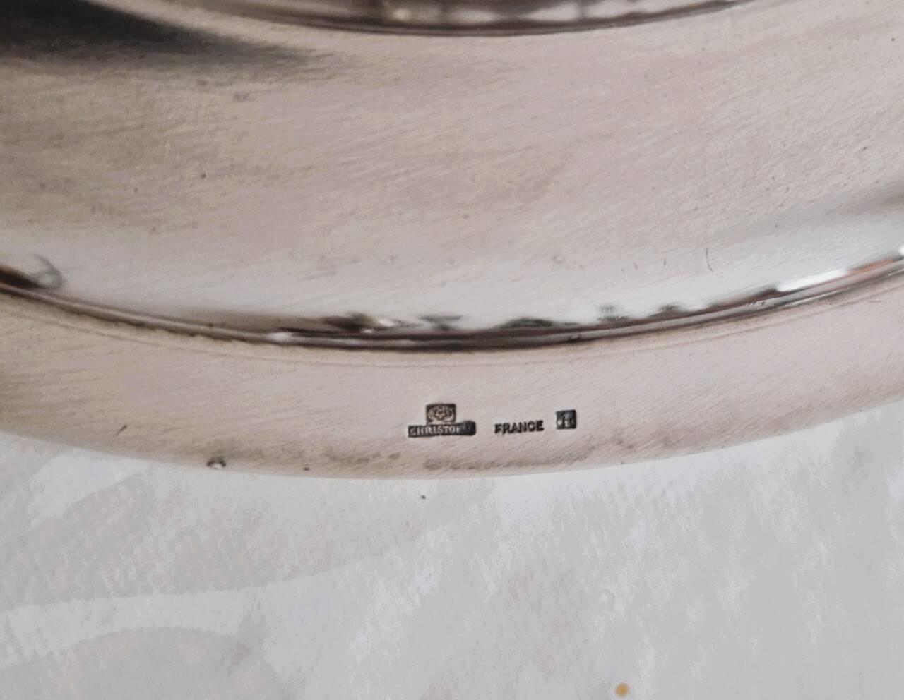 Round silver-plated metal serving dish by Cristofle