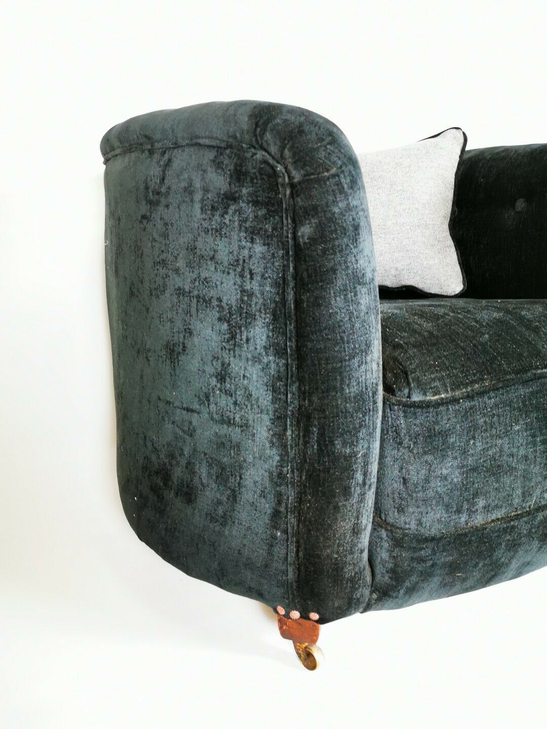 19th century black upholstered victorian tub chair on brass casters