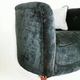 19th century black upholstered victorian tub chair on brass casters