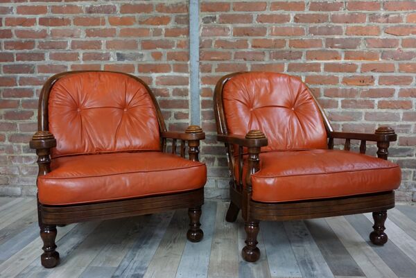 paire De fauteuils Années 60 En cuir Et Bois