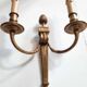 Pair of Louis XVI style bronze wall lights