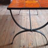 Wrought iron and orange ceramic coffee table