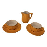 Set of two yellow Apilco coffee cups and saucers and a matching water or milk jar.