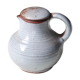 Sandstone milk pitcher by Jeanne and Norbert Pierlot, 60s