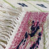 Handmade geometric patterned rug in natural wool