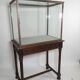 Antique display cabinet in 19th-century Gothic Revival style.