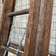Very large vintage sliding wooden ladder
