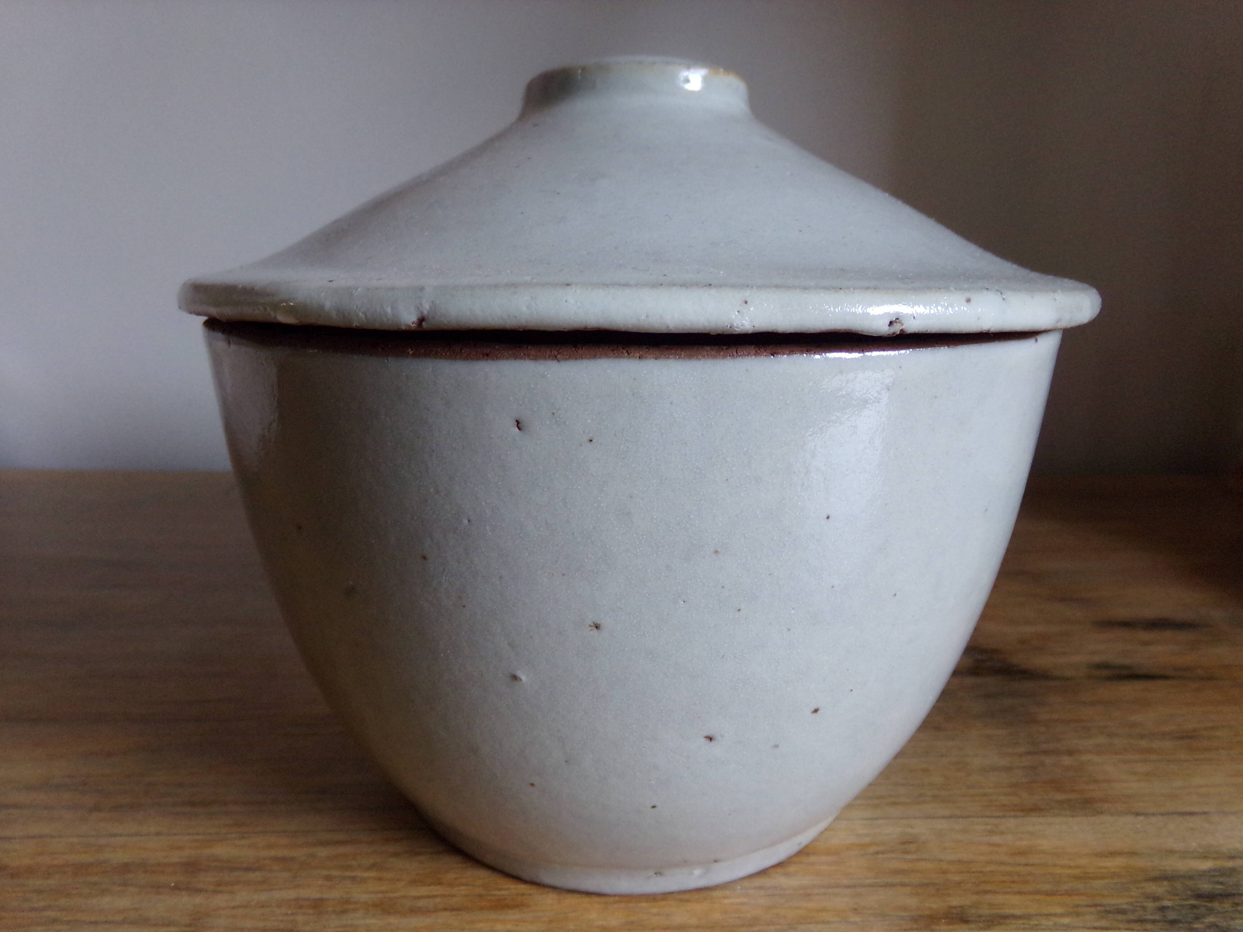 Enamelled terracotta pot