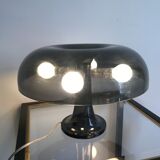 Nessino black pose lamp for artemide by giancarlo mattioli