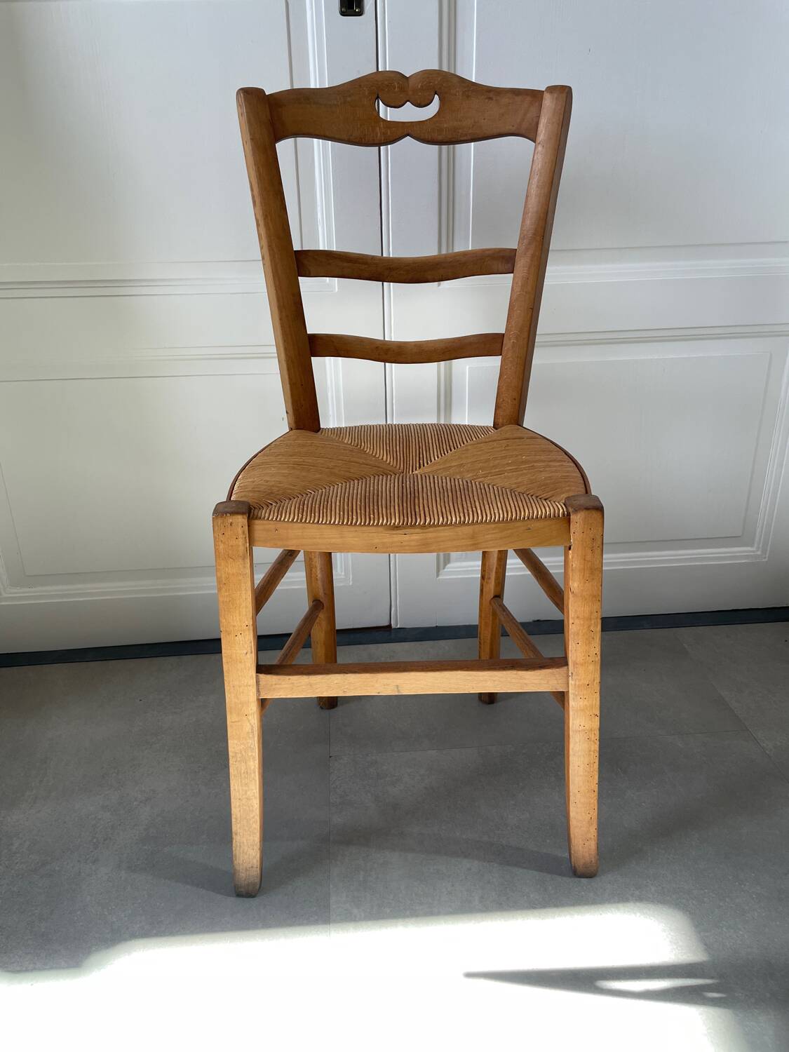 Straw and wood farm chair