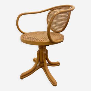 Office armchair in curved wood and canework.