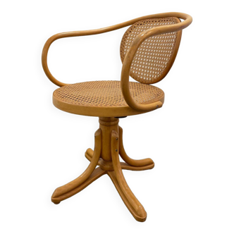 Office armchair in curved wood and canework.