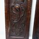 Pair of decorative wall panels in carved wood from the 19th century.