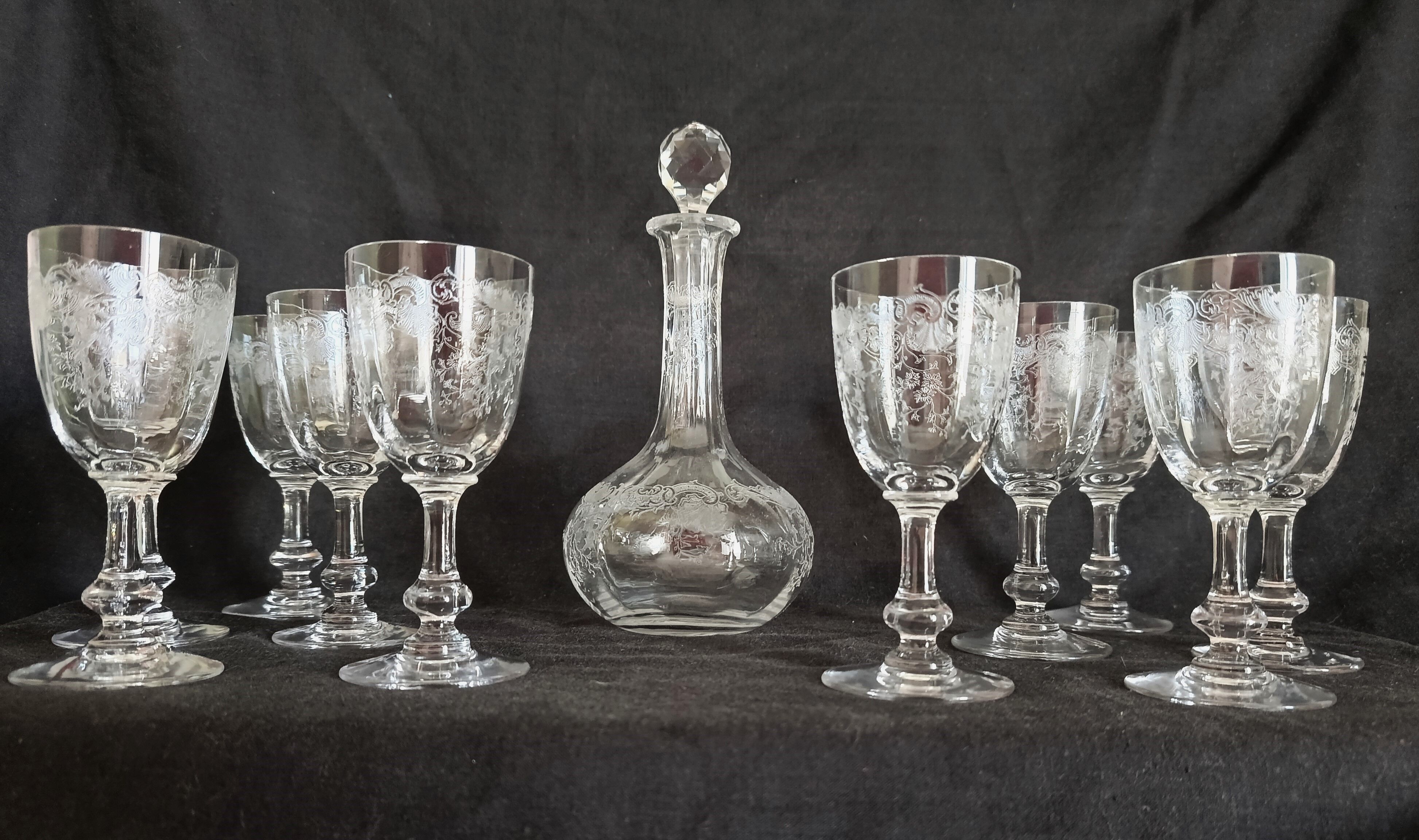 9 crystal white wine glasses from St. Louis model Cléo and their decanter.