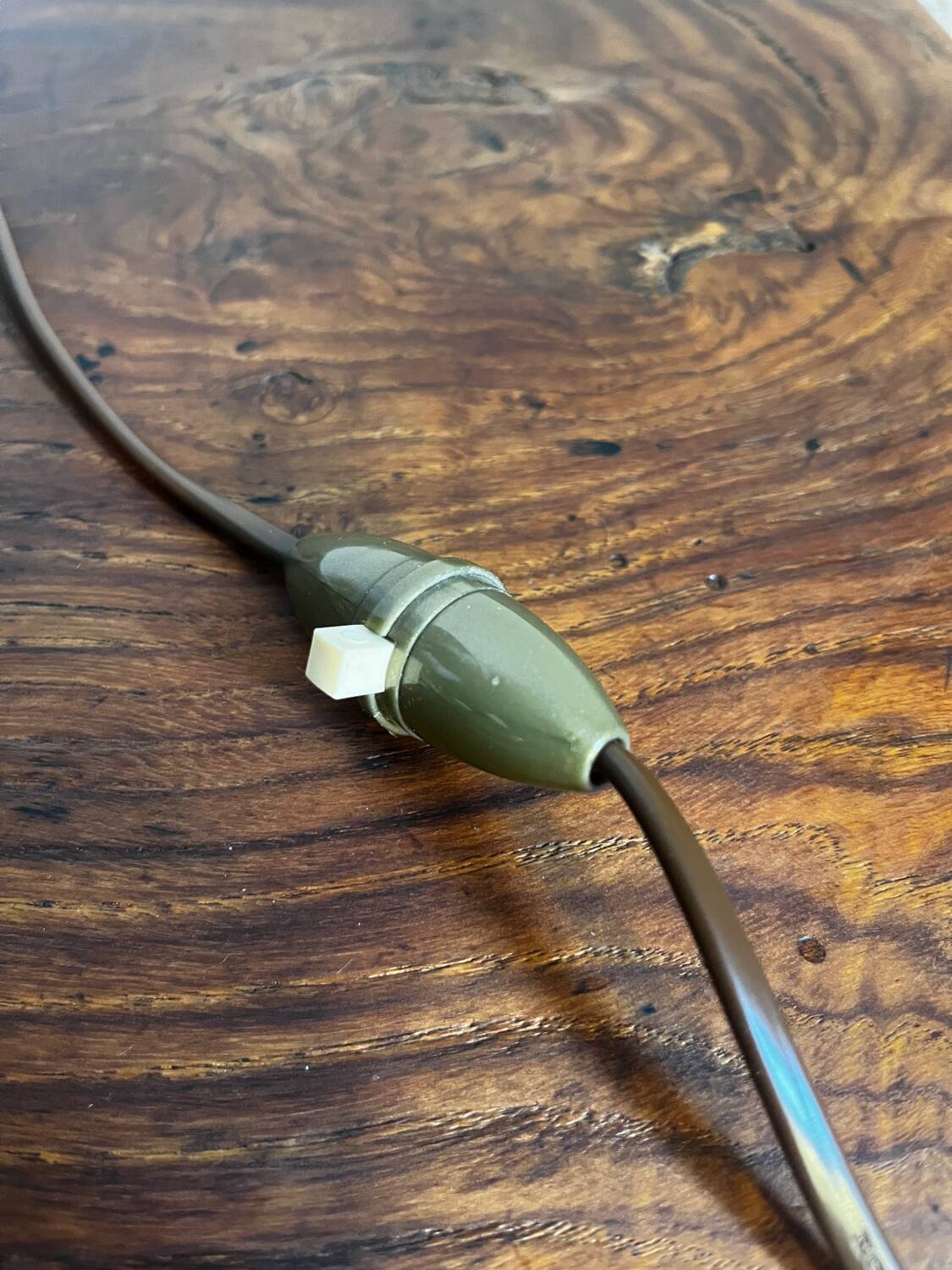 Table lamp with carved wooden base