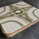 Ceramic tile trivet with vintage pattern woven wicker outline
