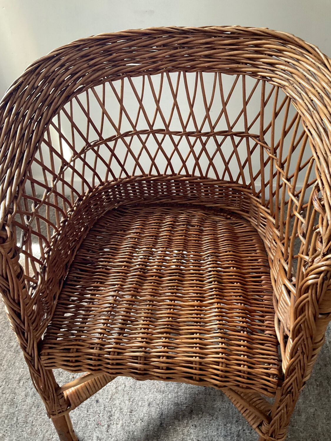 Vintage wicker children's armchair
