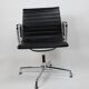 Vintage chair by charles eames ea 108 black leather edition vitra denmark