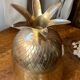 Chiseled brass pineapple