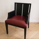 Designer armchair Philippe Hurel model Wallis in red leather and black beech.