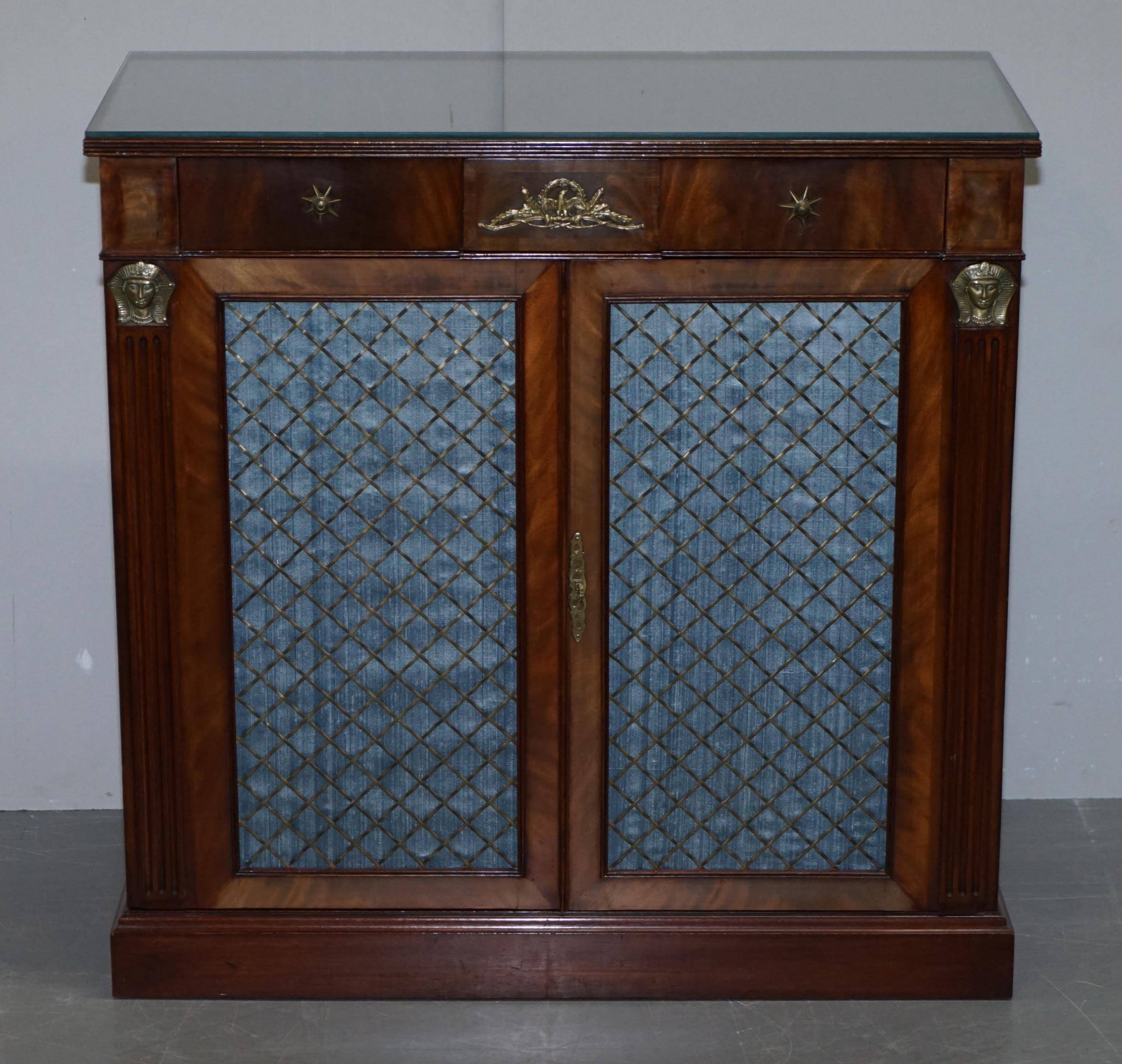 Antique buffet circa 1900 in hardwood and gilded bronze, Egyptian Revival style.