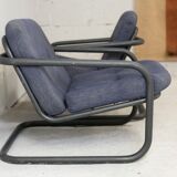 Pair of Prisunic edition armchairs, tubular steel and foam cushions, France, 1973