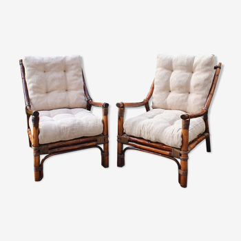 Pair of curved wooden armchairs