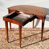 Empire-style demi-lune console from the 19th century.