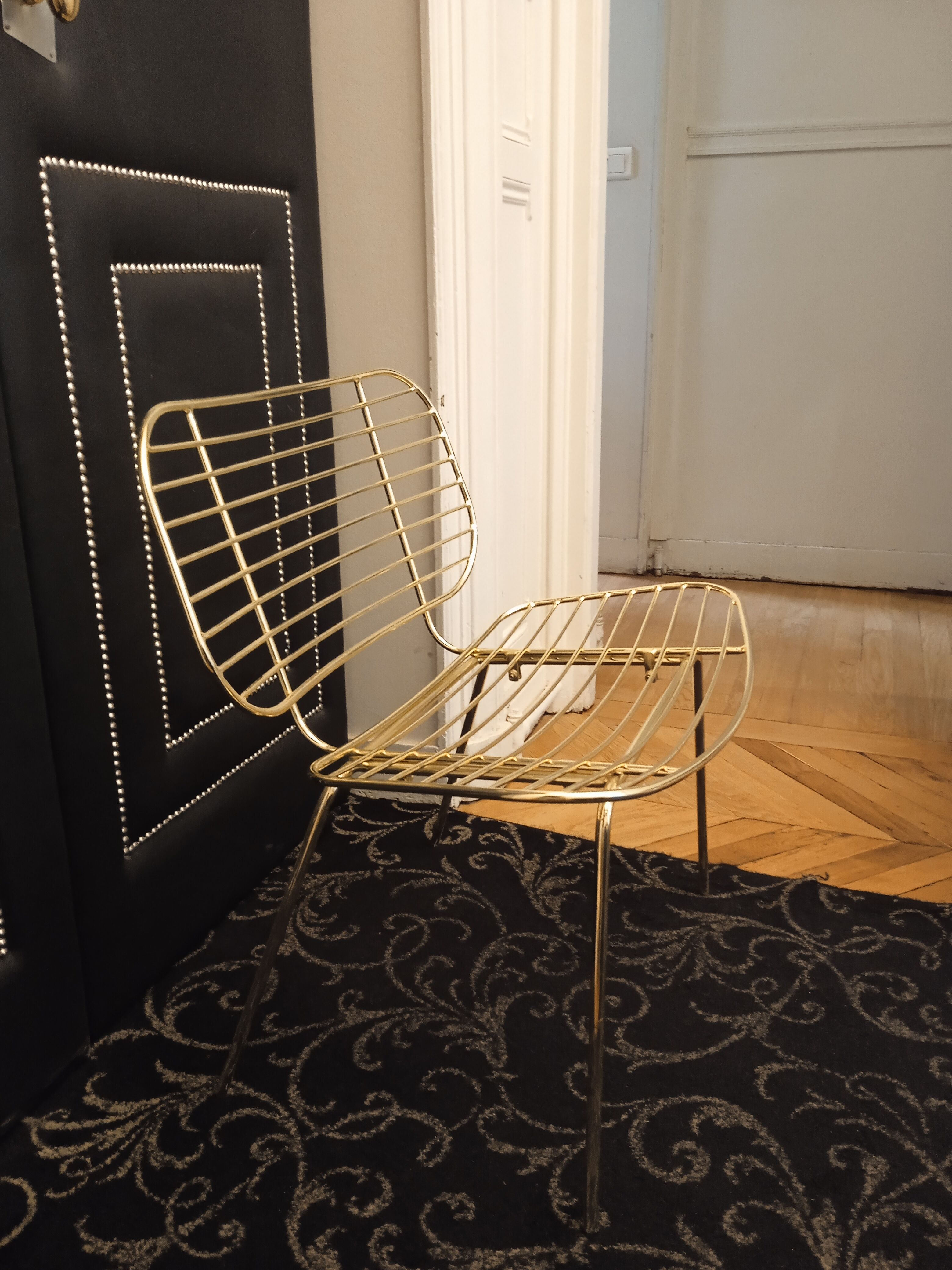 Designer gold wire armchair with cowhide cushion