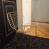 Designer gold thread armchair with cowhide cushion
