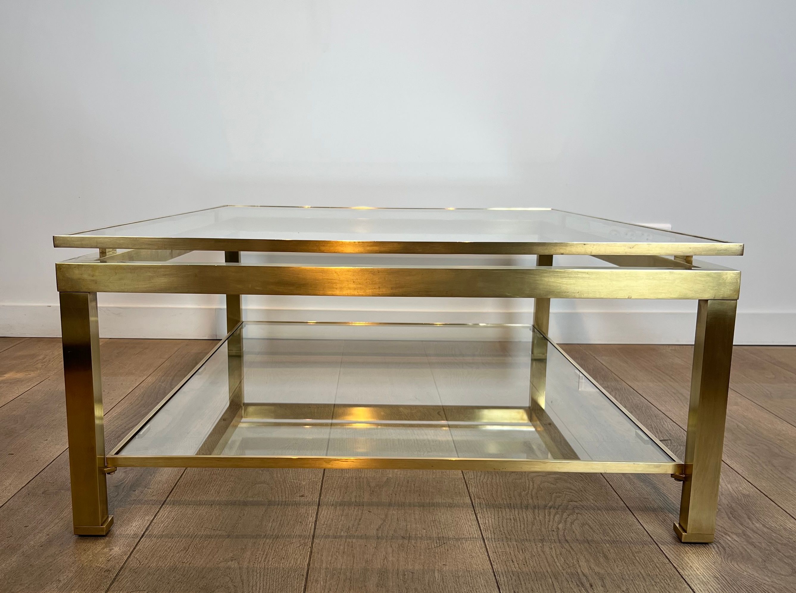 Modernist coffee table in brass and glass tops by Guy Lefèvre for Maison Jansen.