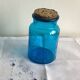 Blue glass jar with Henkel cork stopper - vintage